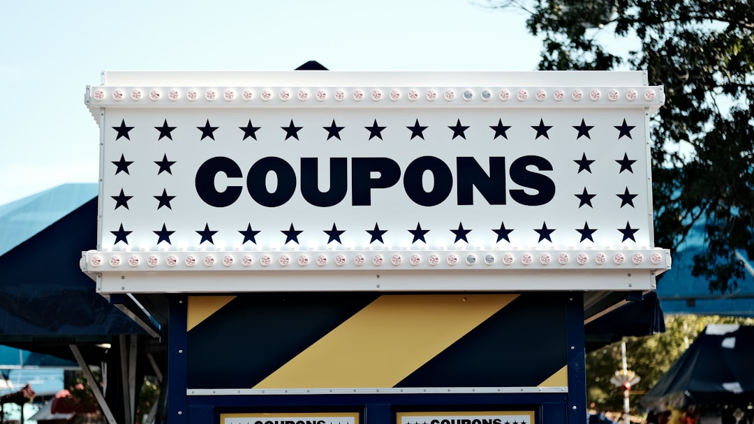 a-sign-that-says-coupons-on-it-umps8zf6fb0